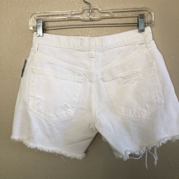 Free People Optic White Maggie Mid-Rise Button Front Fly Distressed Jean Shorts - Picture 5 of 14